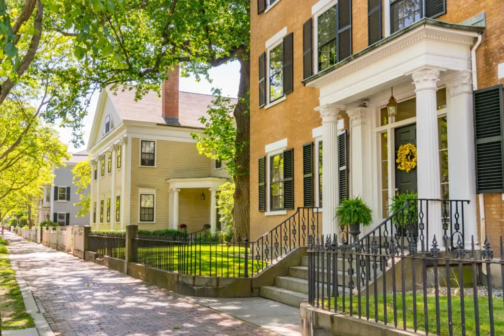 Historic Brick Federal Style Townhouse with Corinthian Columns and Black Iron Railings.jpg